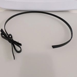 Saks Fifth Avenue brand black belt with bow closure. Size S. Classic accessory!